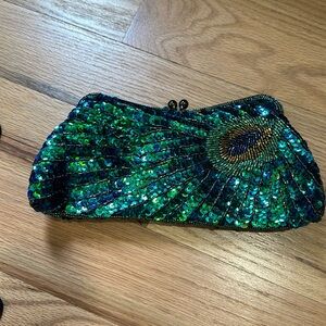 Sequined peacock clutch purse